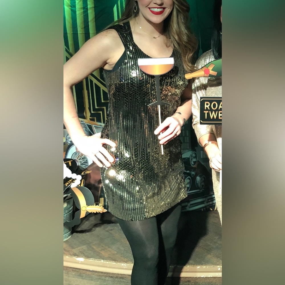 Black and gold sequin dress
